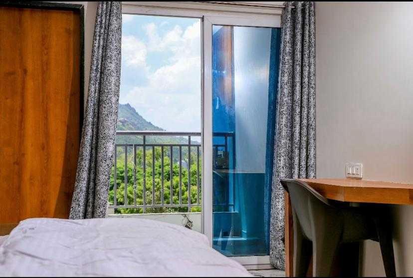Super Townhouse Ambaji Formerly Hotel Kardhar Inn Εξωτερικό φωτογραφία